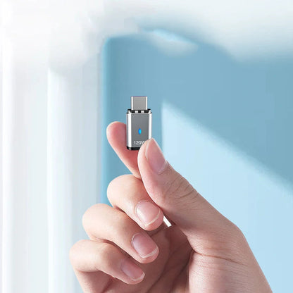 Dark grey magnetic charging adapter showing elbow connection design with multiple adapter heads for different device ports