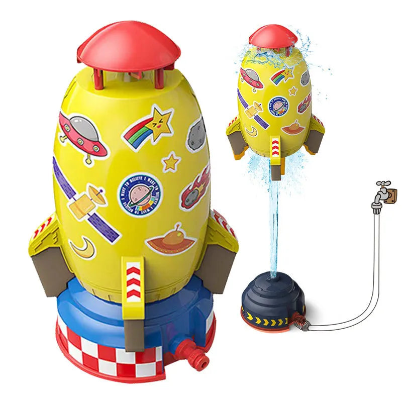 Yellow outdoor water pressure rocket launcher toy for kids on a green lawn.