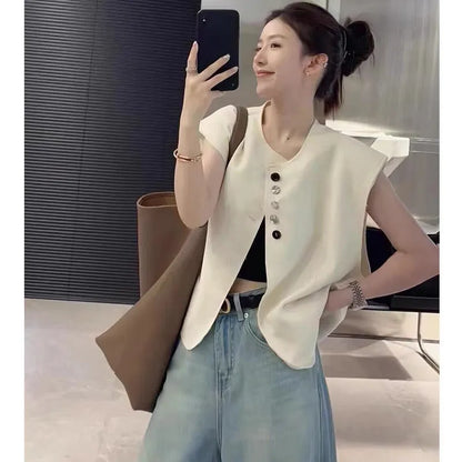 Beige loose-fit women's waistcoat with pockets on a hanger, showing short 40cm length and V-neck design.