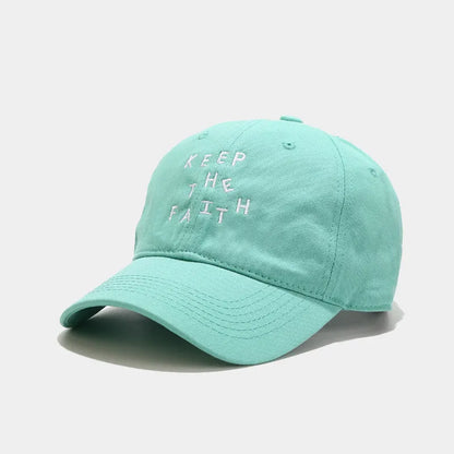 Men's cotton baseball cap with small embroidered letters on front in adjustable dome design