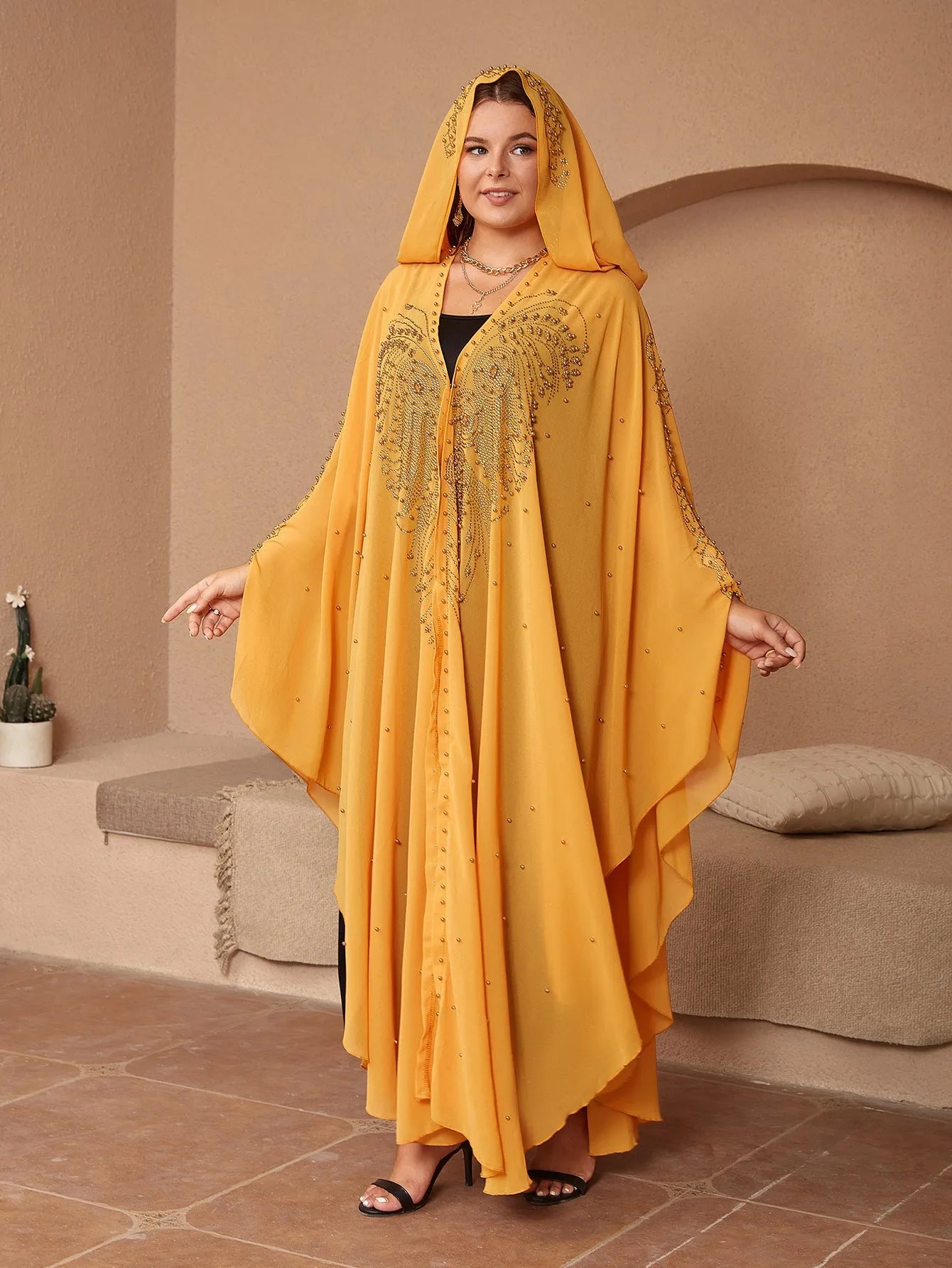 Purple chiffon Muslim style shawl with rhinestone beaded trim laid flat showing its long length.