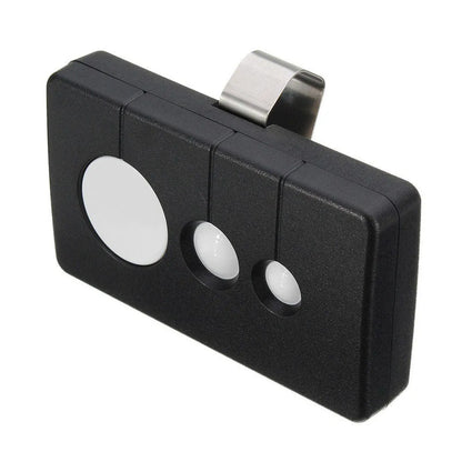 Black three-key garage door remote control with 390 MHz frequency and Rolling Code technology.