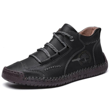Men's brown leather mid-top boots with front lace-up and rubber sole