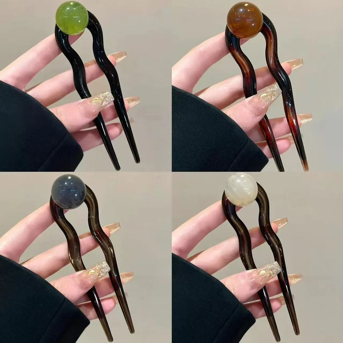 A set of U-shaped acrylic hair barrettes with a simple ball decoration in beige, caramel, and dark grey colours.