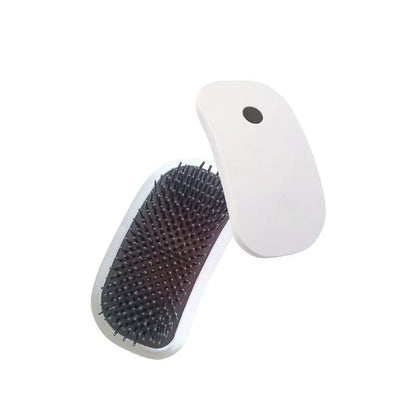 Fuigarry pink handheld electric pet grooming brush with soft TPE teeth on a white background