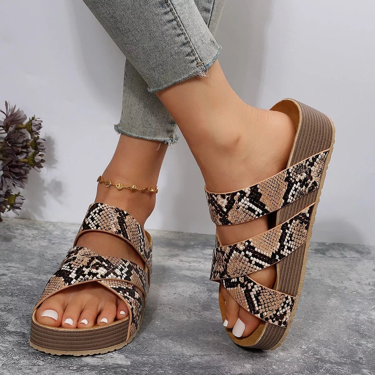Women's woven cross-strap slippers in various colours, perfect for summer beach outings