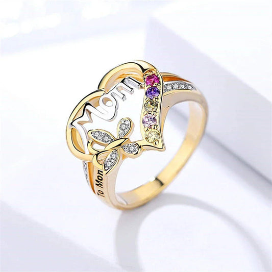 A shimmering heart-shaped jewelry set with a multicolor rhinestone design, including a ring and coordinating necklace, a thoughtful Mother's Day gift.