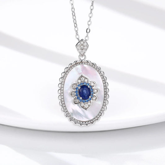 Elegant sapphire and diamond pendant necklace in 925 sterling silver, featuring a sparkling gemstone design and adjustable chain.