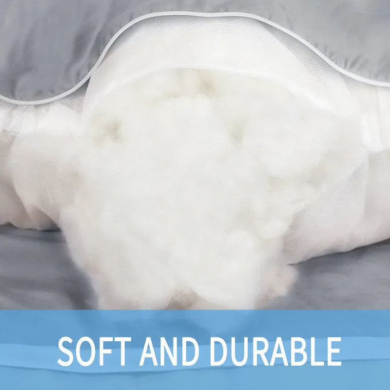 Light blue U-shaped ice silk maternity pillow for pregnancy support on a bed