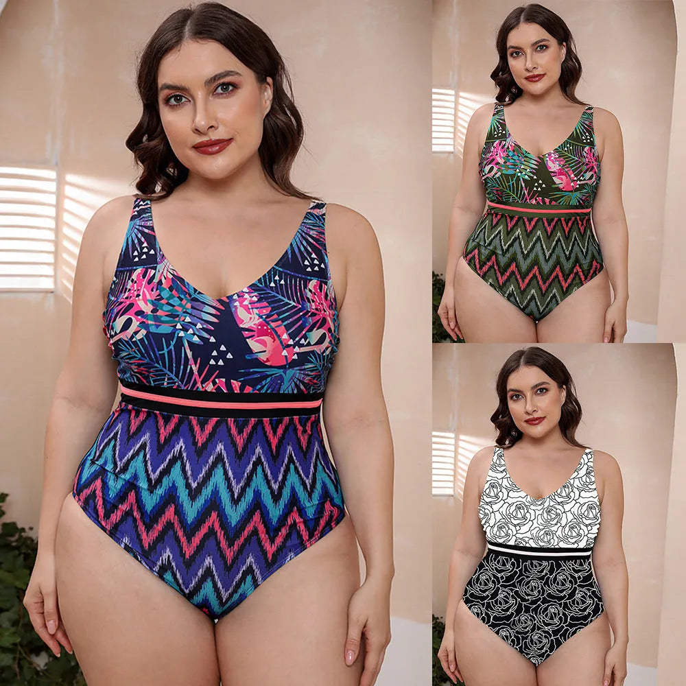 Blue and white printed women's one-piece swimsuit with spaghetti straps and a striped vest design.
