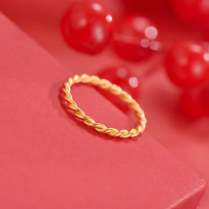 Gold-plated brass women's ring showing twist and simple bracelet styles in matte and glossy finishes.