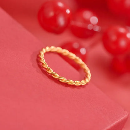 Gold-plated brass women's ring showing twist and simple bracelet styles in matte and glossy finishes.