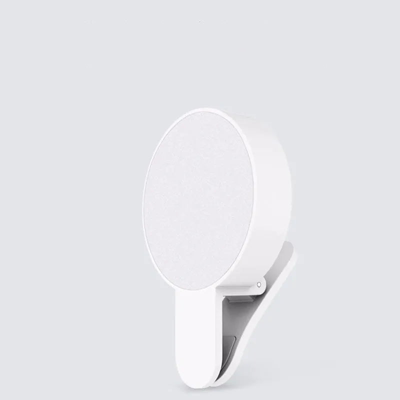 Compact white selfie fill light for mobile phones with USB cable, showing 9 LED beads and three-level dimming switch.
