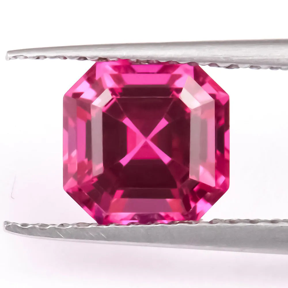 Synthetic pigeon blood red ruby gemstone showing egg shape, round, and princess square cuts