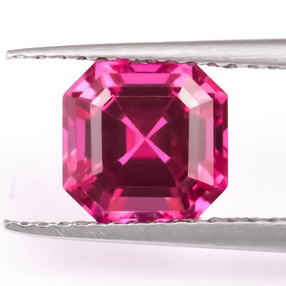 Synthetic pigeon blood red ruby gemstone showing egg shape, round, and princess square cuts