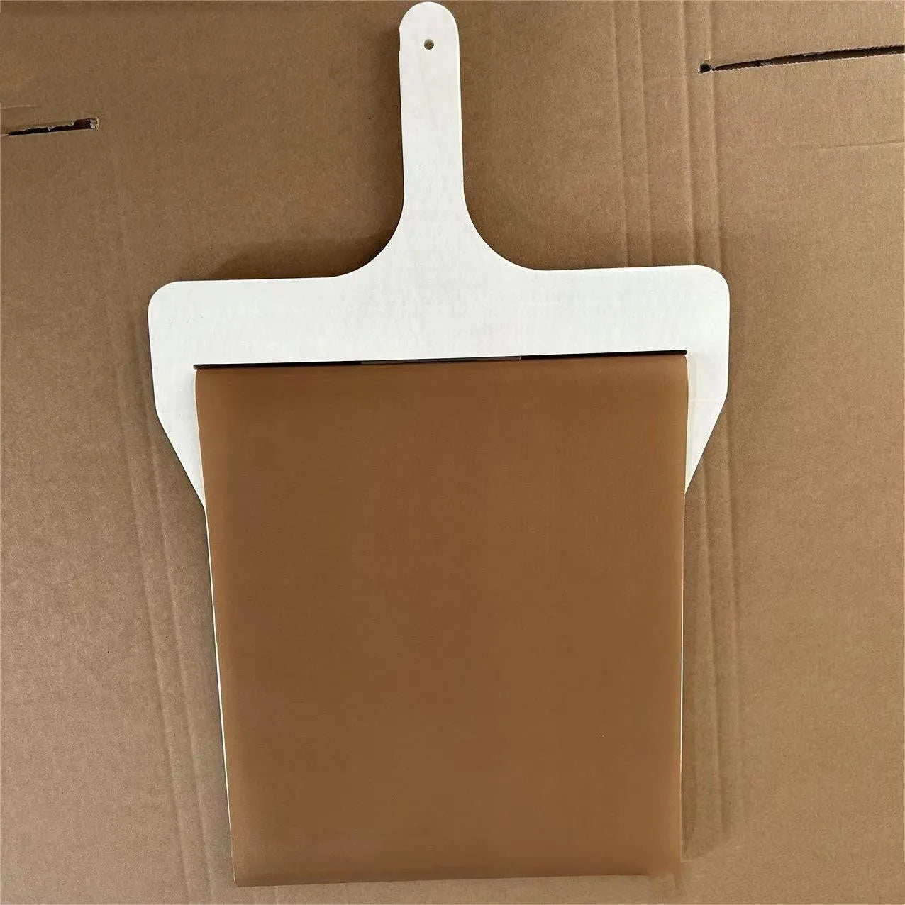 Wooden sliding pizza peel storage board in natural log colour with three size options.