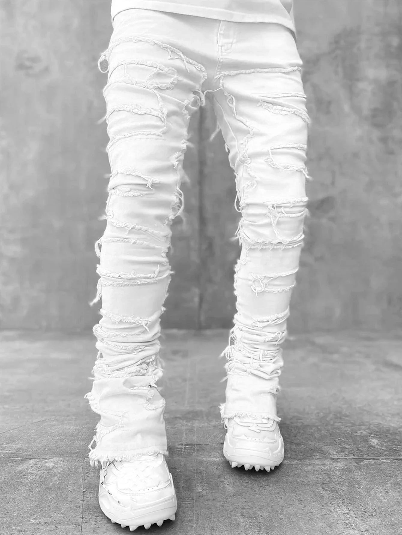 Men's slim-fit cotton jeans with unique patched design in various classic colors