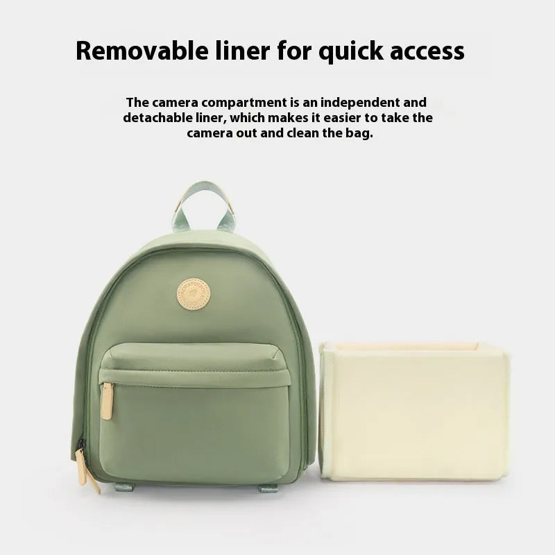 CW Medium Black women's shoulder camera bag with detachable iPad compartment and a curve belt strap.