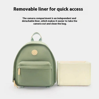 CW Medium Black women's shoulder camera bag with detachable iPad compartment and a curve belt strap.