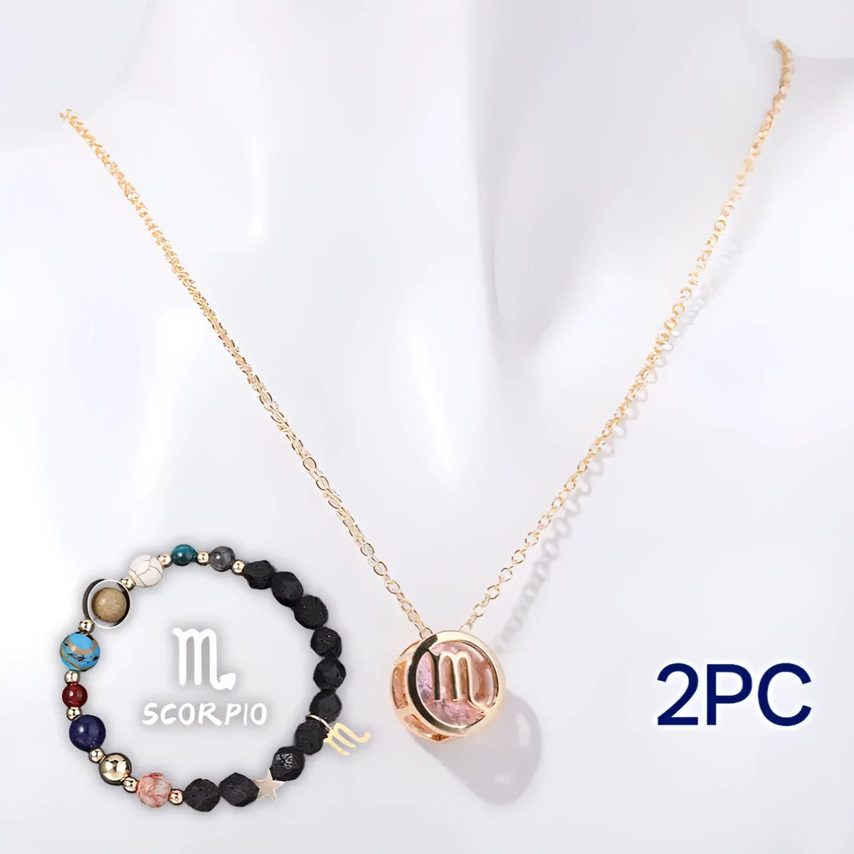 A natural stone beaded necklace and matching bracelet set laid flat, showcasing varied bead colours and textures.