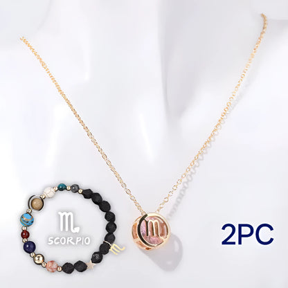 A natural stone beaded necklace and matching bracelet set laid flat, showcasing varied bead colours and textures.