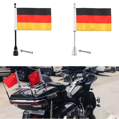 Motorcycle tail box flagpole for mounting on luggage carrier, in black or silver finish.