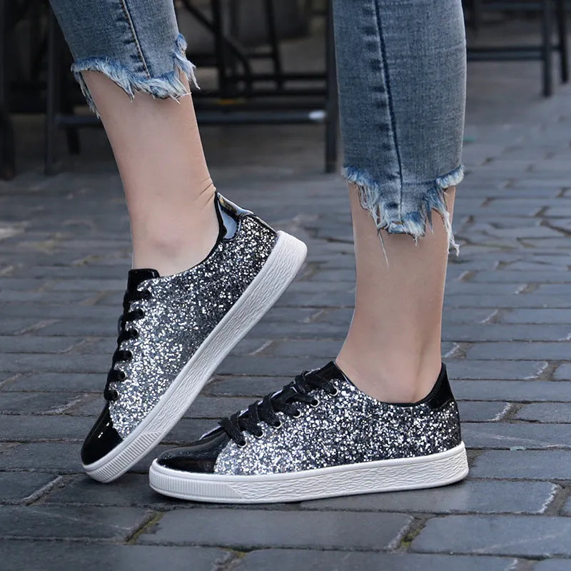 Women's low-top casual shoes with colourful PU sequin uppers, round toe design, front lace-up closure, and durable rubber soles. Available in black, pink, or gold colours and EU sizes 36 to 41 for year-round wear.