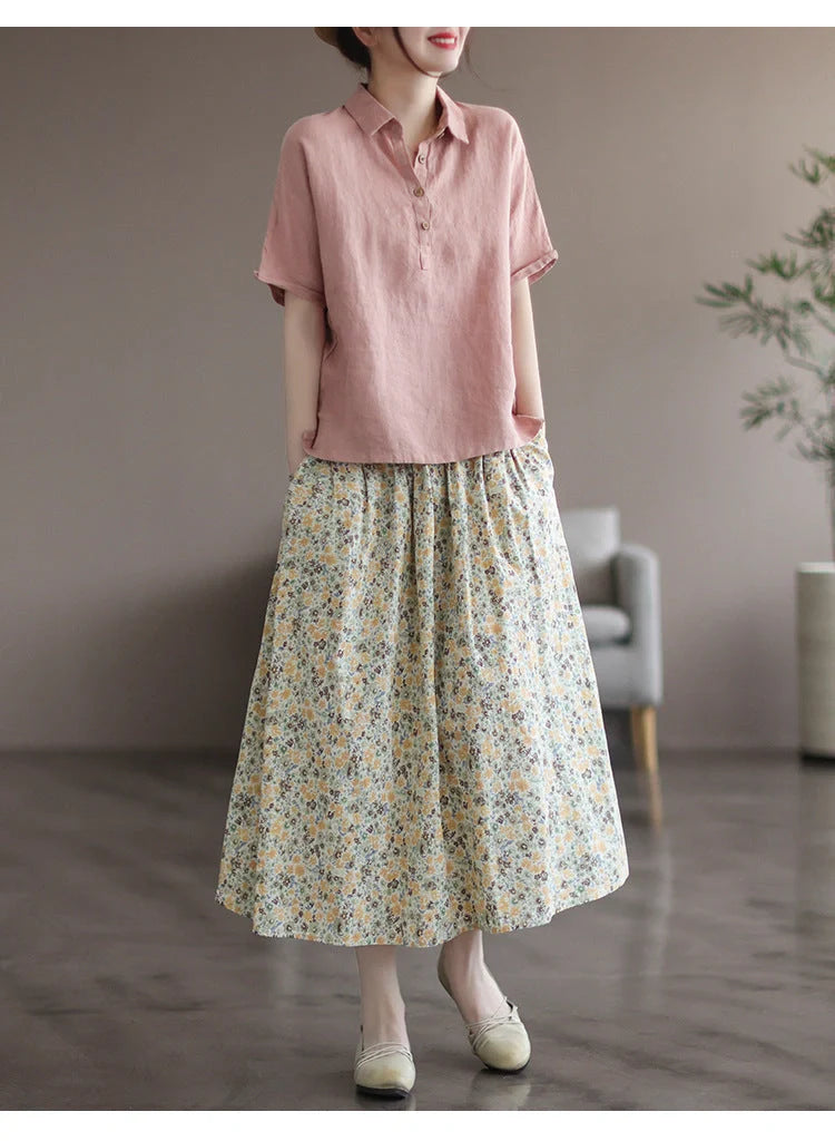 Elegant floral-printed cotton skirt with pleated design, available in yellow and blue flower patterns