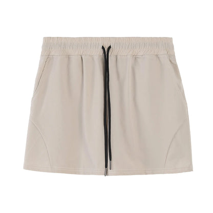 Men's thin grey polyester basketball shorts with an elastic waistband, shown laid flat.