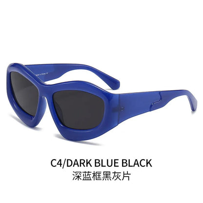 Outdoor unisex sunglasses with concave bubble lenses in black frame on a table.