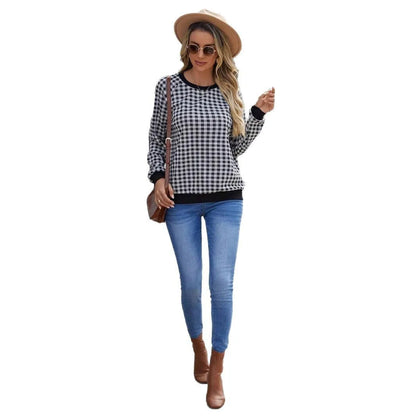Black plaid pullover sweater with striped pattern and long sleeves, showing printing detail on polyester fabric