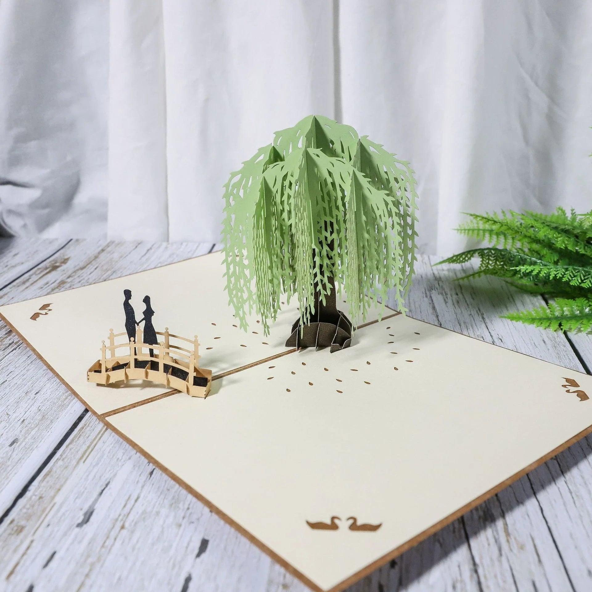 Exquisite 3D pop-up greeting cards for lovers, featuring a variety of romantic motifs like roses, landscapes, and couples.