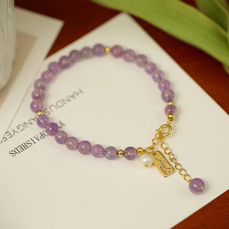 Women's natural lavender amethyst crystal bracelet in elegant design on wrist