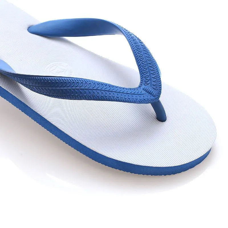 Rubber flip-flops with fish label design on strap, shown in green, red, blue, and black colour options.