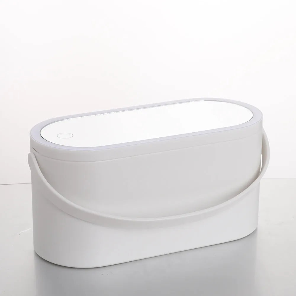 Pink gradient makeup storage box with LED mirror open, showing internal compartments and USB charging port.