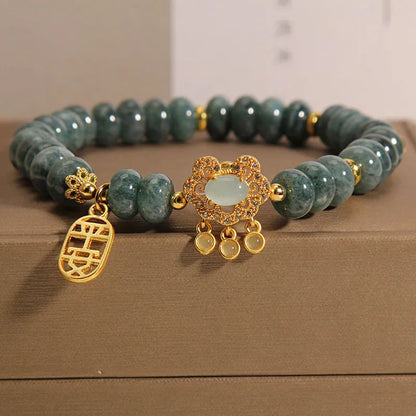 Women's natural emerald jade bracelet with abacus bead design and safety lock clasp