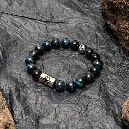 Little Lion ethnic geometric bracelet made from brown Bodhi seed beads on a wrist.