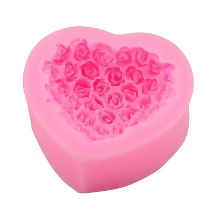 Pink silicone heart-shaped mould with a love design for Valentine's Day crafting.