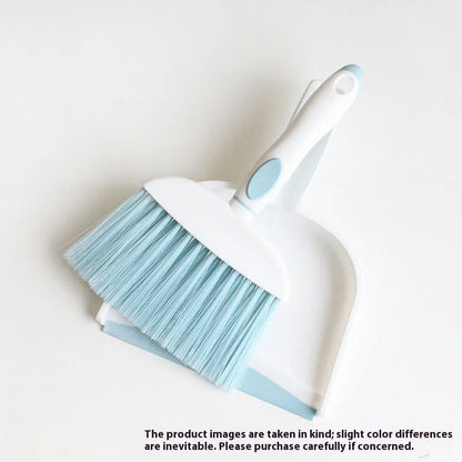 Small plastic handheld dustpan and brush cleaning kit in assorted colours.