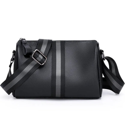 Black genuine leather one-shoulder crossbody bag with large main compartment and polyester lining.