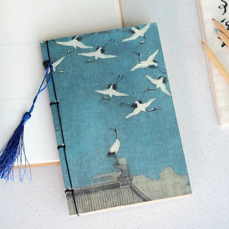 A5 antique wire-bound notebook with classical artwork cover, black oil wax rope binding, and decorative tassels