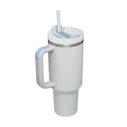 40oz stainless steel tumbler with handle and straw in various colour options showing tapered shape and spill-proof lid