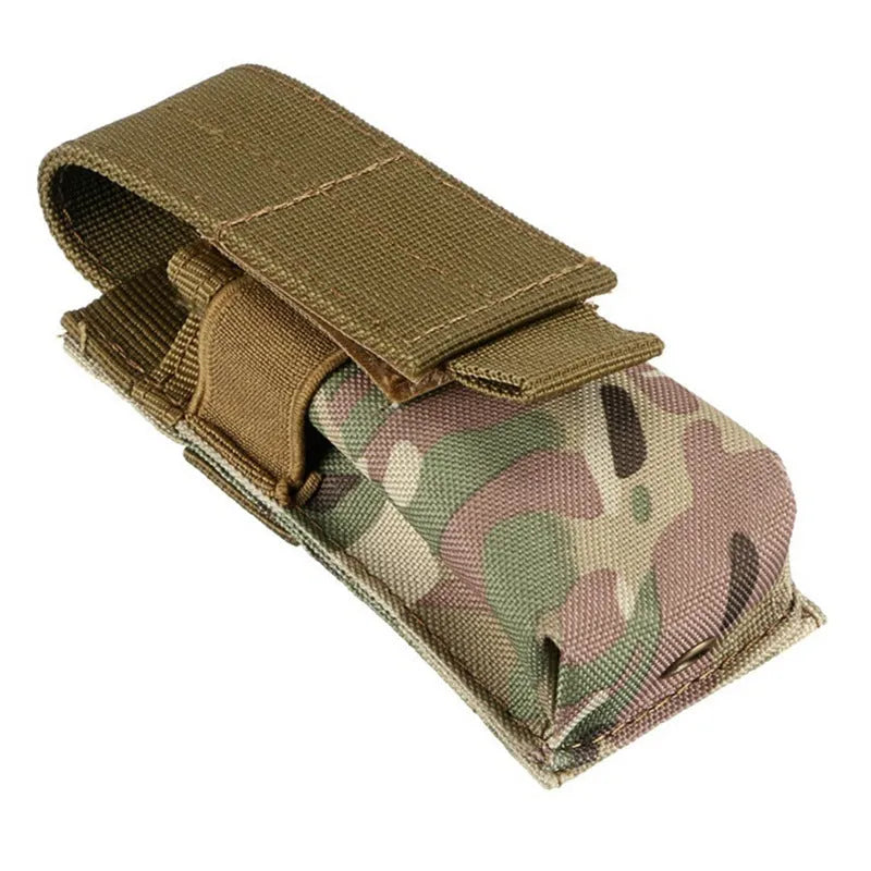 Black tactical MOLLE waist pouch with elastic cord closure, shown mounted on a belt next to a pistol magazine.