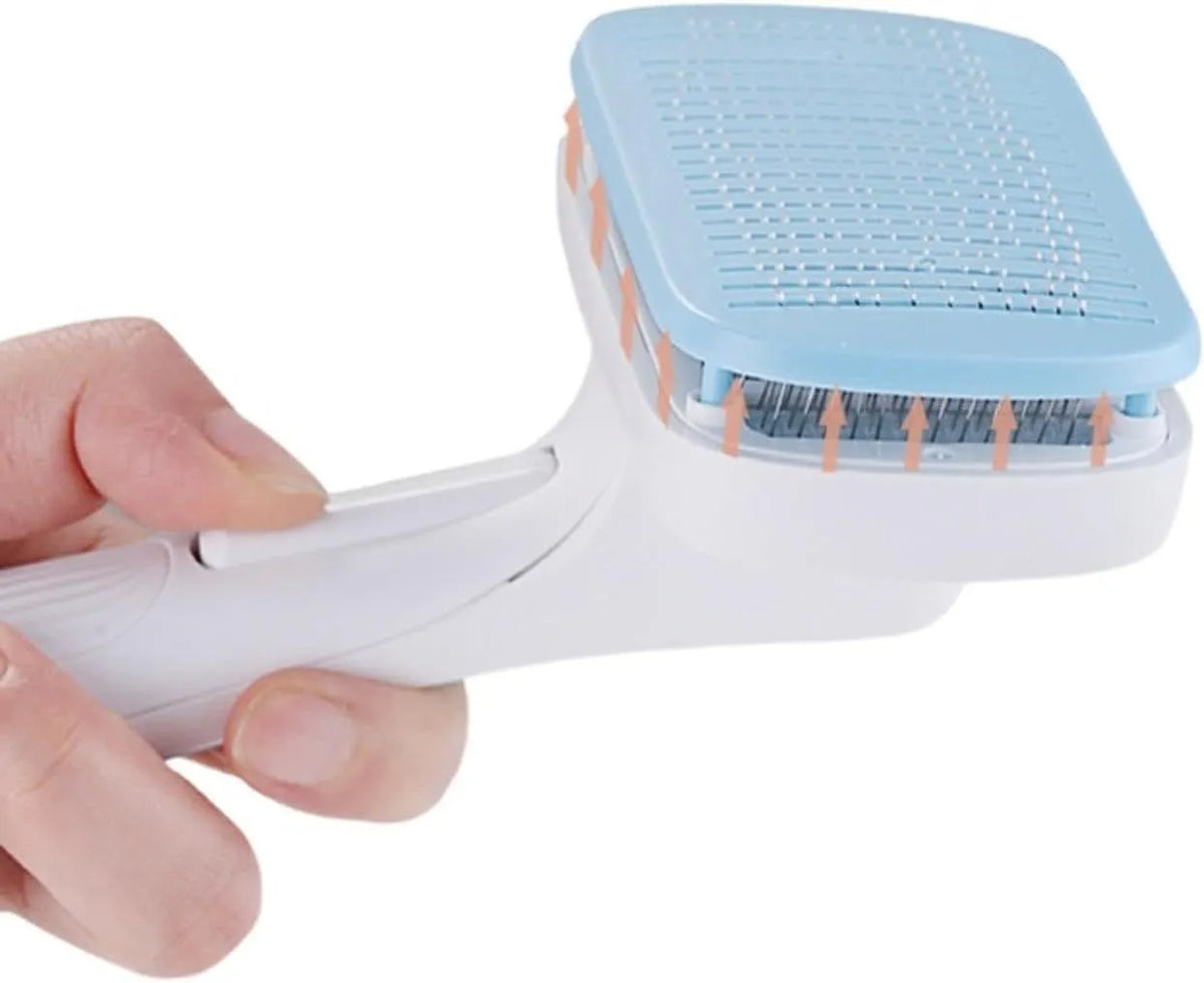 Blue automatic pet comb with one-click button for removing dog and cat hair on a table.