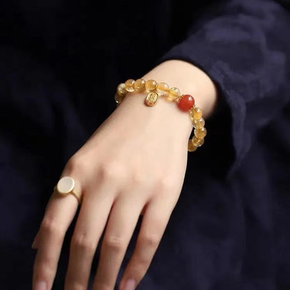 Polished red agate bead bracelet showing 6mm, 8mm, and 10mm size options.