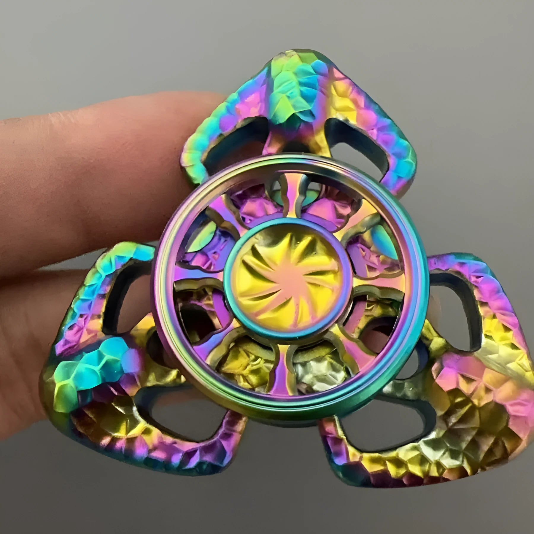 Alloy metal Flame Butterfly design rotating fingertip fidget gyro toy in grey or colourful finish.