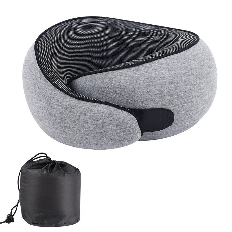 U-shaped memory foam neck pillow for travel shown with its storage bag.