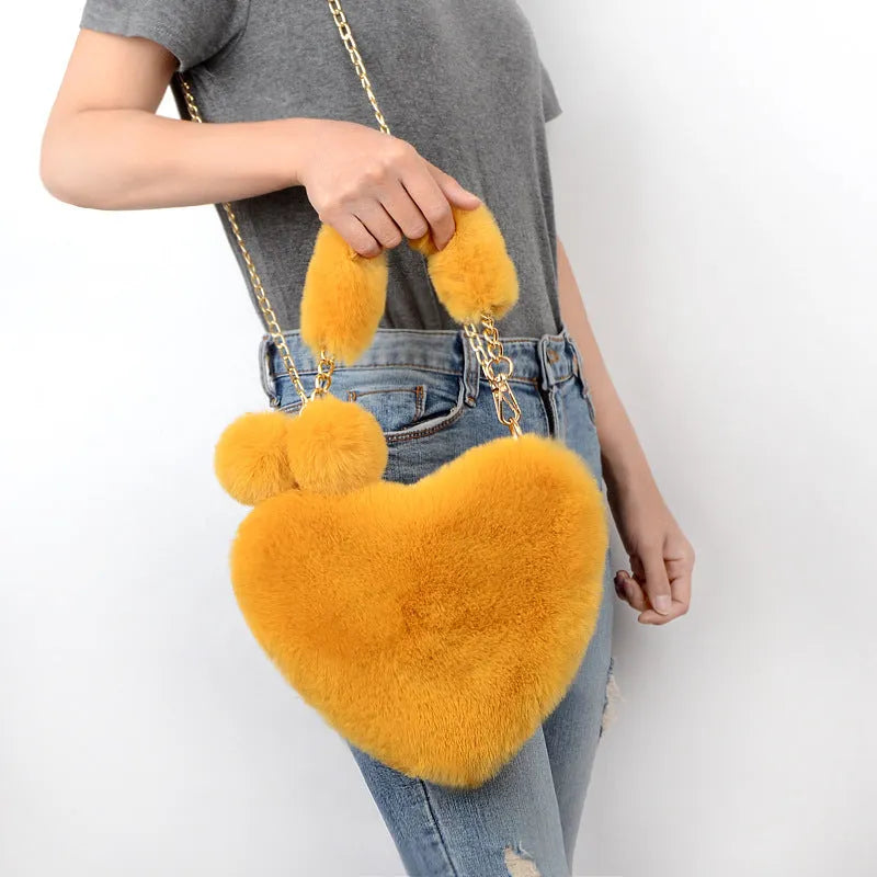 Plush heart-shaped women's handbag in medium size with removable shoulder strap