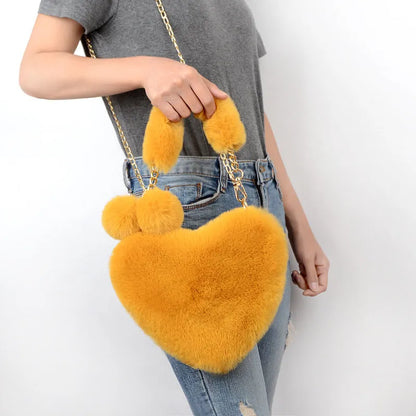 Plush heart-shaped women's handbag in medium size with removable shoulder strap