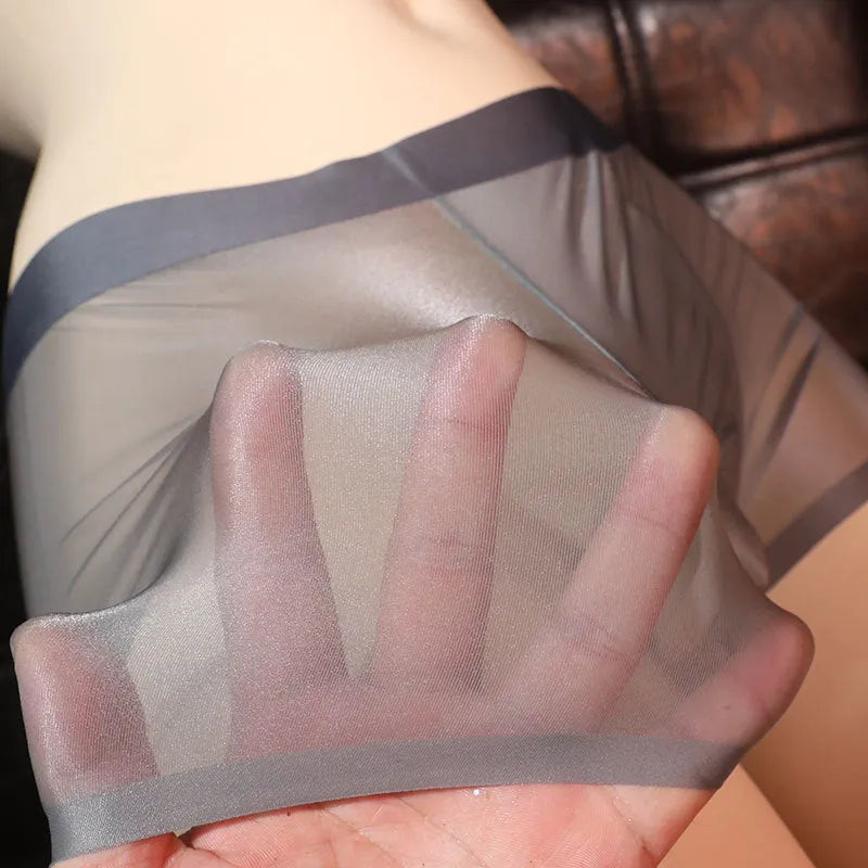 Men's ultra-thin transparent boxer briefs in ice silk nylon fabric showing light grey colour option